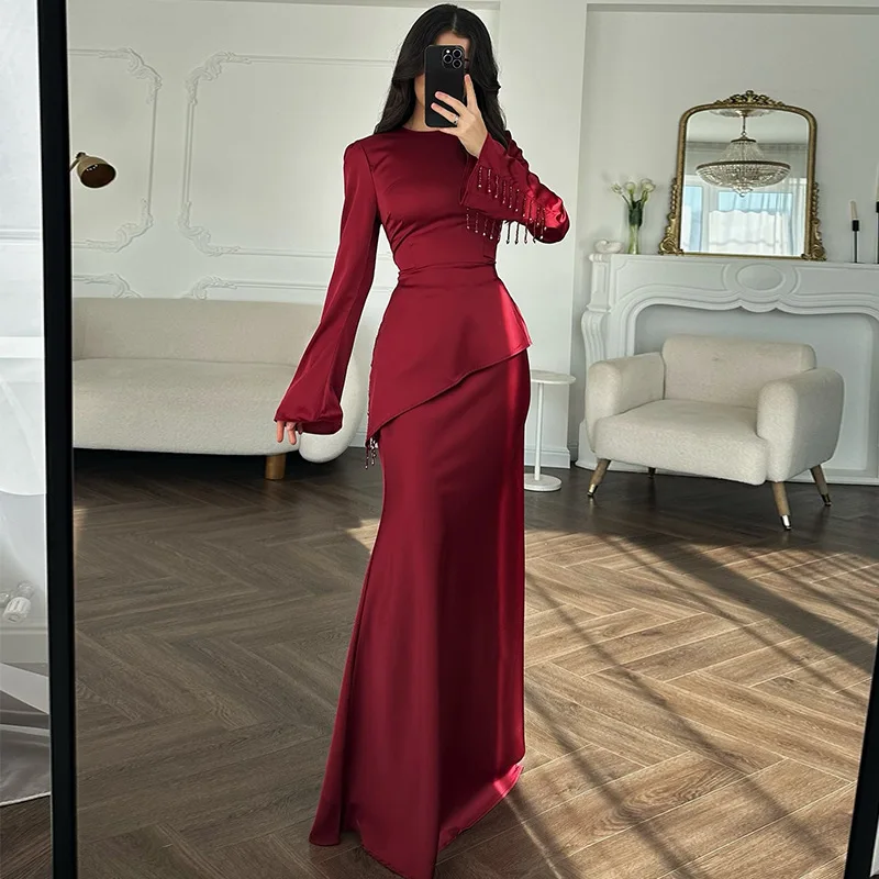 

Women's clothing 2025 autumn and winter new style temperament heavy industry long sleeved irregular top high waist skirt set