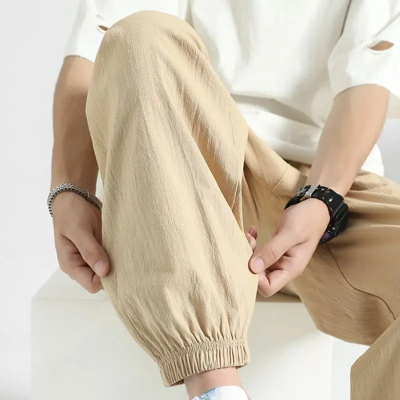 

Spring Autumn New Fashion Solid Color Cotton Hemp Men's Clothing Loose Pocket Elastic Waist Drawstring Bound Feet Casual Pants