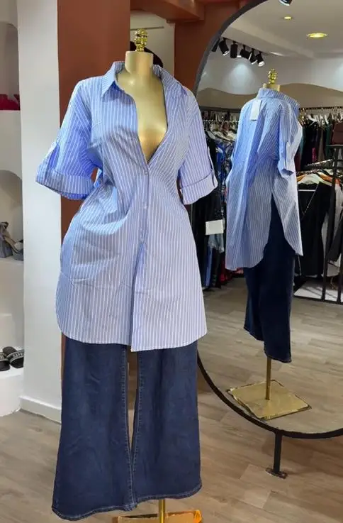 بلوزة حريمي 2025 لربيع وصيف موضة جديدة مخططة مطبوعة بياقة مقلوبة واحدة الصدر وأكمام قصيرة قميص متوسط الطول #1