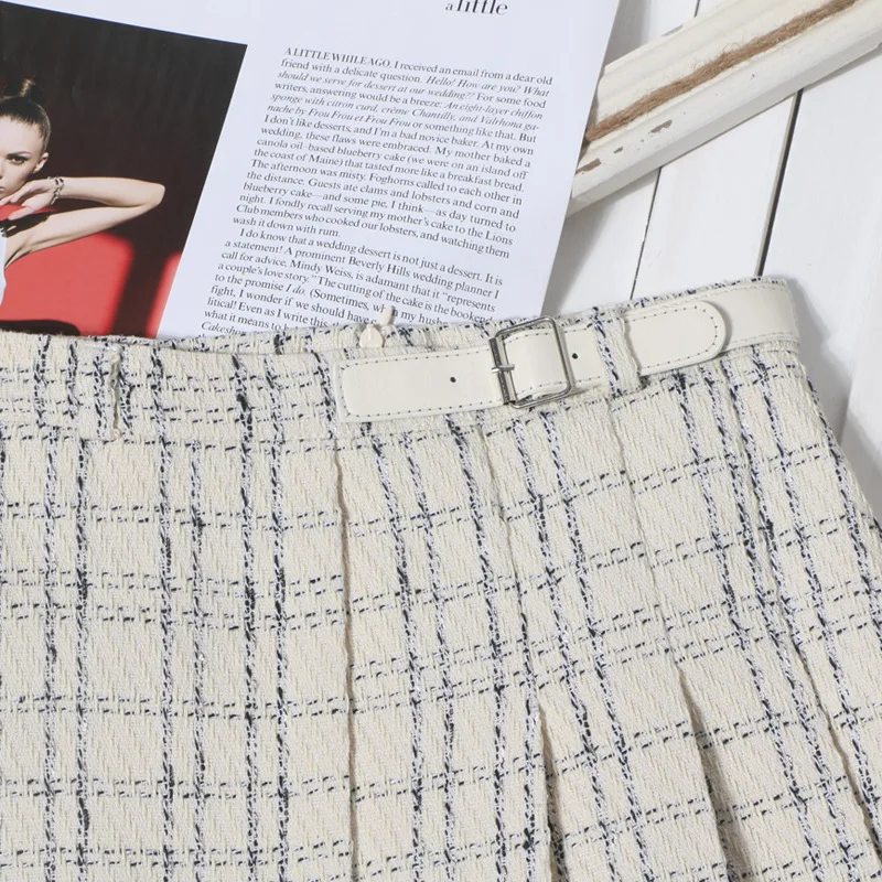 Media falda de lana a cuadros de otoño/invierno para mujer, falda acampanada plisada adelgazante de cintura alta, estilo pequeño fragante, 2025