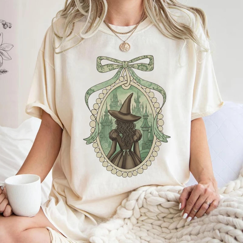 เสื้อวินเทจจากภาพยนตร์ Wicked for Good: เสื้อยืดเอลฟาบาและกลินดา, เสื้อสเวตเชิ้ตพ่อมดแห่งออซ