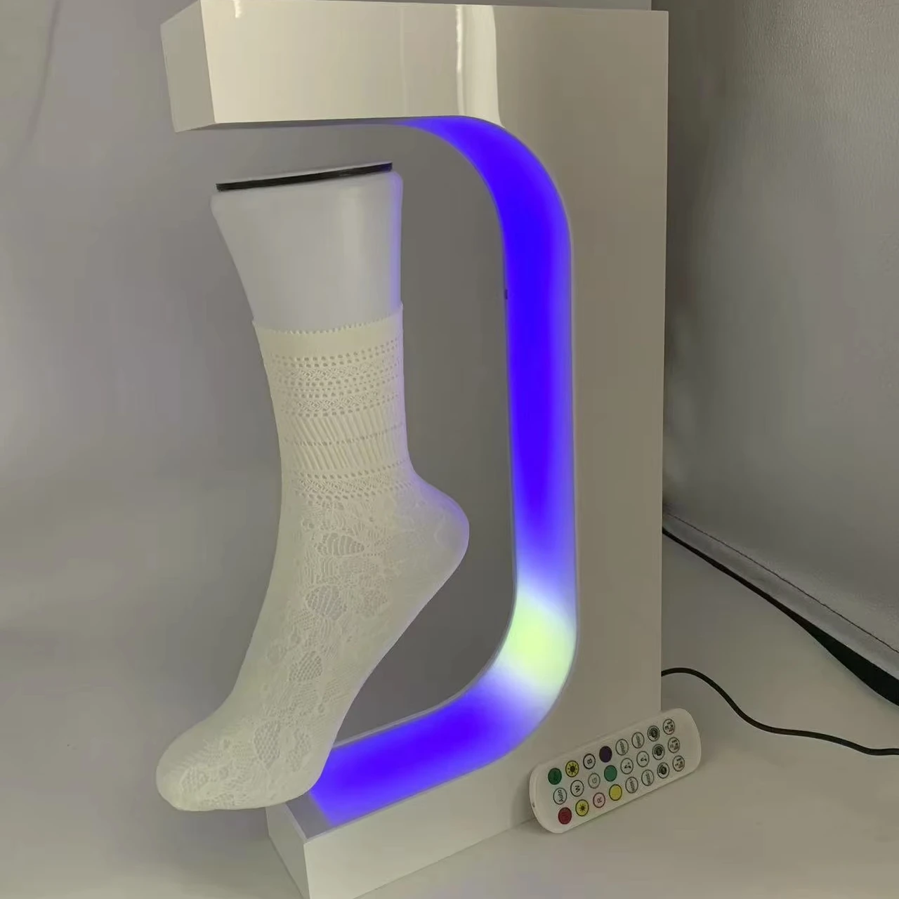 

Colorful Led Light Magnetic Levitation Suspension Sock Display Stand With Logo Custom