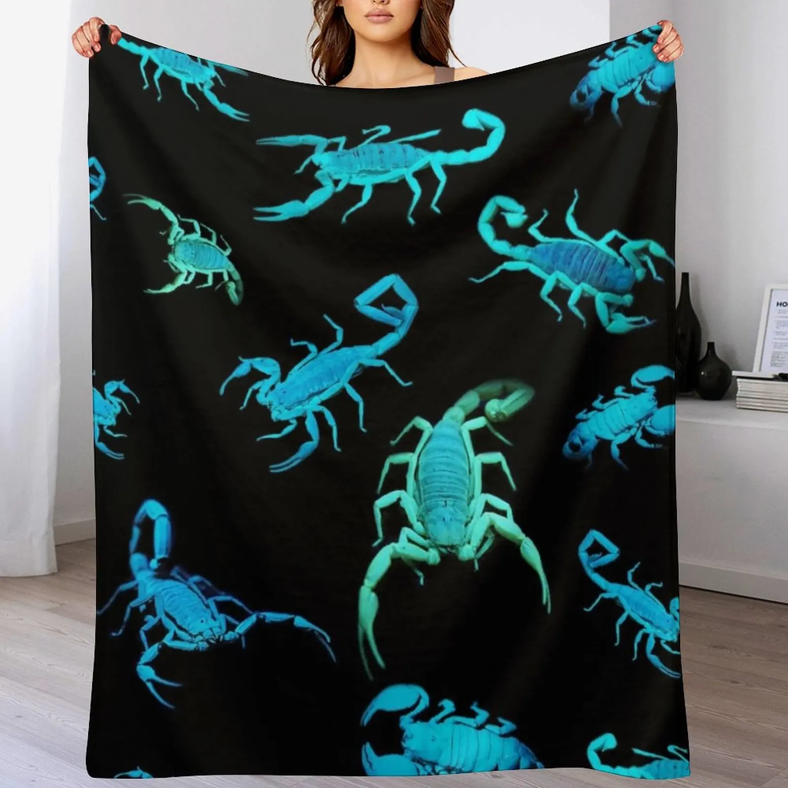 

glowing scorpion Throw Blanket