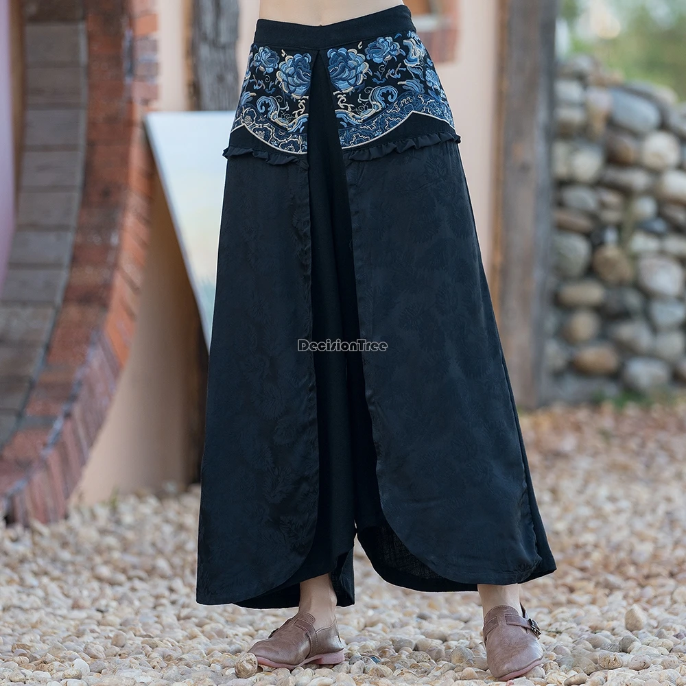 

2025 new chinese ethnic style embroidered wide-leg pants women retro patchwork design cotton linen elastic waist long pants t001