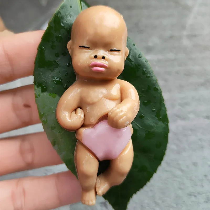 創造的で現実的な醜い人形、tpr遅いリバウンドおもちゃ、面白い手のひら柔らかいゴム製のスクイーズおもちゃ、ストレス解消の幸せなおもちゃ