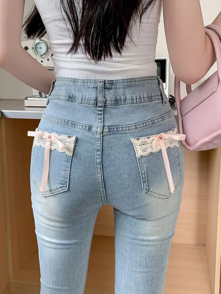 Jeans feminino laço arco estilo americano alargamento magro denim cintura alta outono inverno azul fino até o chão elegante feminino doce