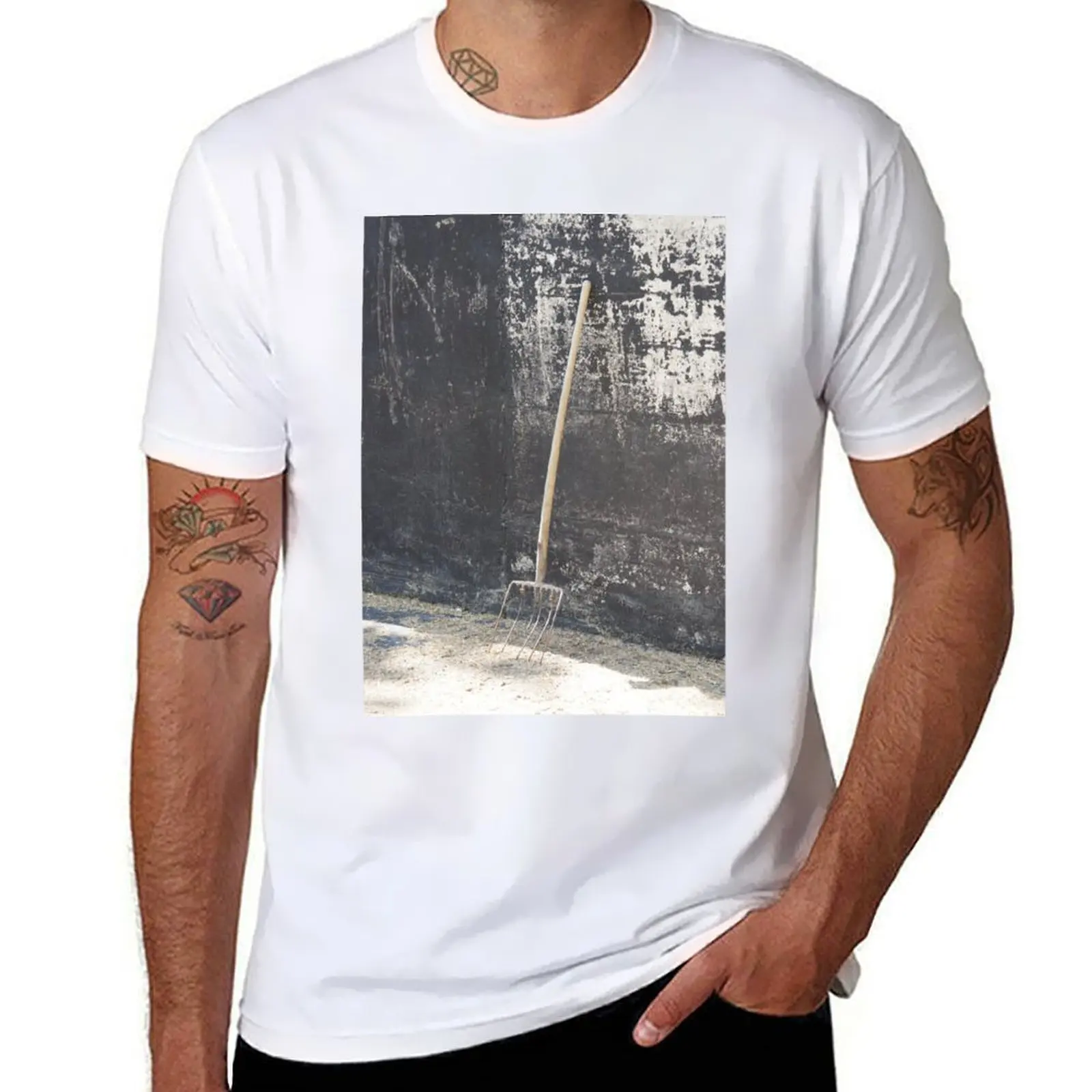 

Pitchfork on wall in barn T-Shirt t shirts with prints man t shirts graphic T-Shirt