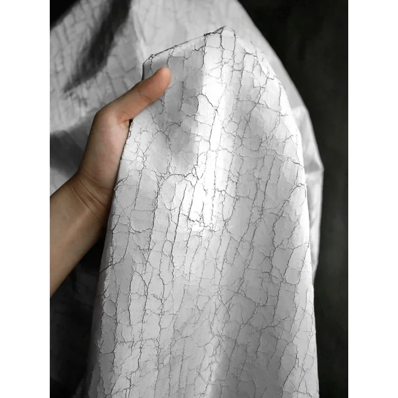 Craftsmanship Crack Texture Silver White Coating Fabric Creative Background High-end Coat Clothing Designer Fabric