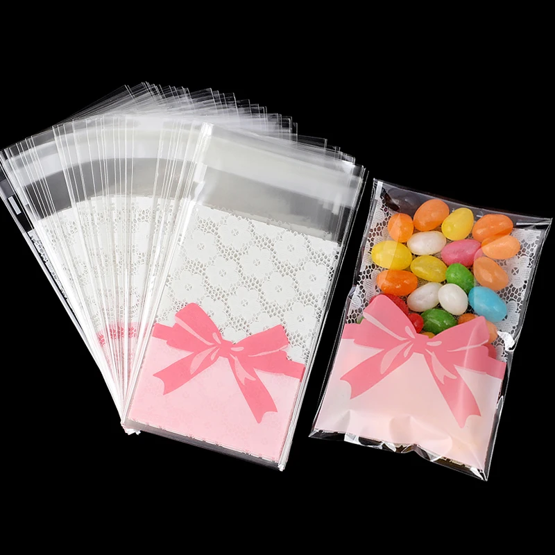 50 Stücke Rosa Schleife Süßigkeiten Tasche Blume OPP Selbstdichtende Cookie Geschenk Snack Verpackung Taschen Geburtstag Hochzeit Party Dekoration Lieferungen