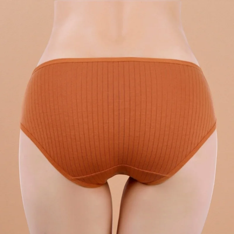 Close-up detail of ribbed fabric and bow