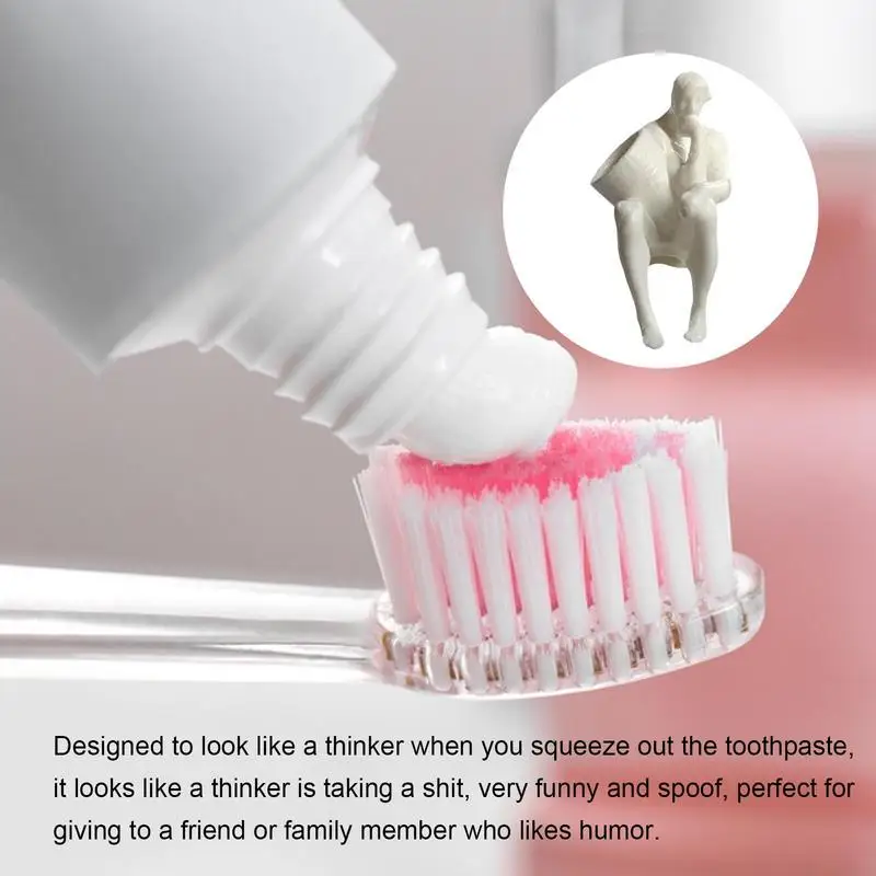 Tricky Funny Thinker Pooping Little Man Toothpaste Squeezer Creative Weird 3D Toothpaste Head Toothpaste Cover Prank Toy