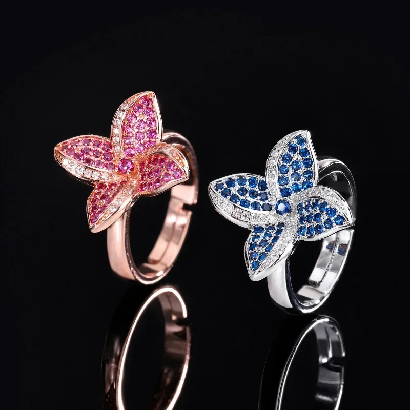 

Elegant Adjustable Flower Shaped Ring with Pink and Blue Crystals Women Unique Floral Design Jewelry Perfect for All Occasions