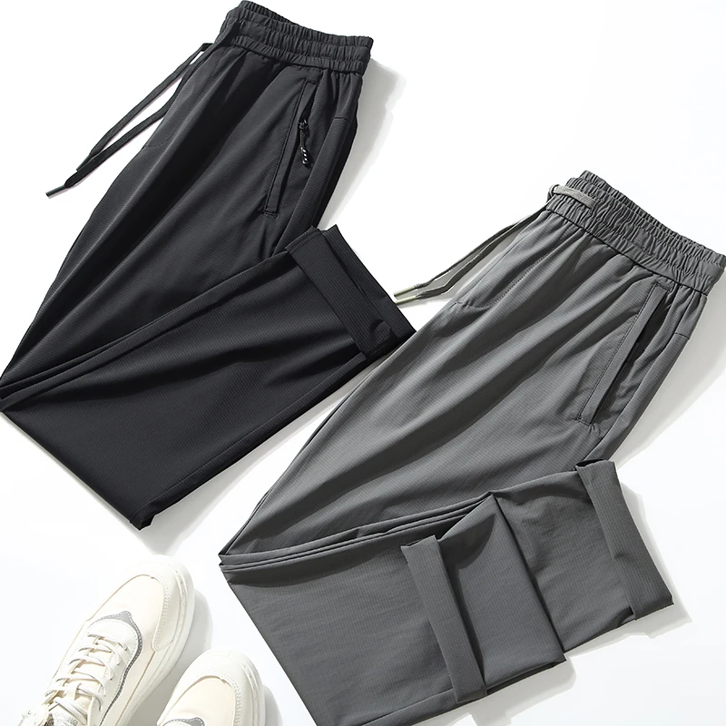 

High Quali Ice Silk Men's Casual Pants Breathable Elastic Waist Sports Faion Urban Sle Spring Summer New Arrivals