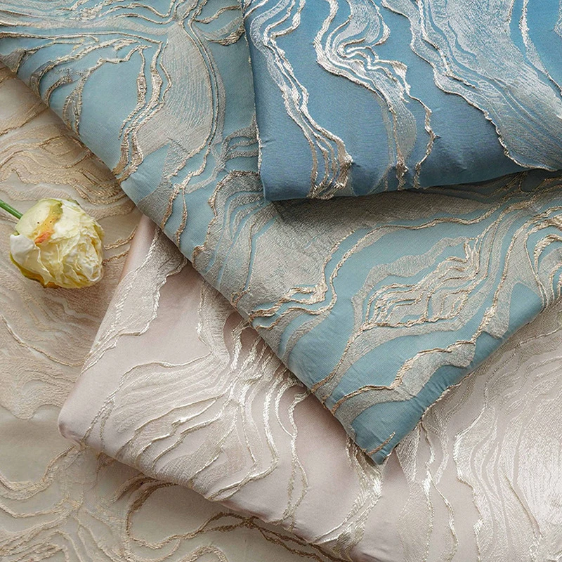 

Chinese 3D Embossed Gold Silk Wave Pattern Jacquard Designer Fabric For Diy Sewing Skirt Hanfu Dress Coat Suit Bag High Quality