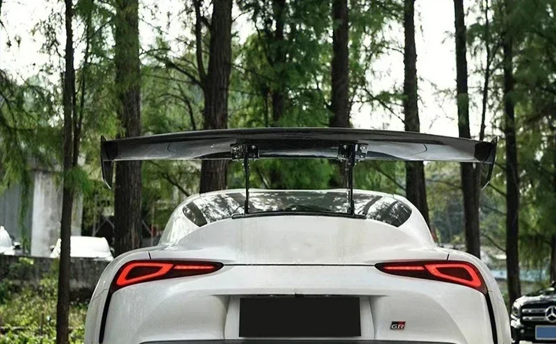 

Applies to: Toyota SupraA90 A91 Bull Demon King VRS Carbon Fiber Rear Body Kit Accessories Fixed Wind Wing