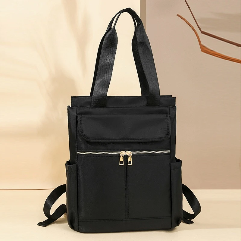 Europe and the United States new shoulder bag women's contrasting outdoor travel backpack Oxford portable leisure shoulder bag.