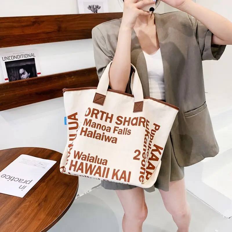 Letter canvas bag women\'s summer large capacity bag 2023 New Korean personality hand-carrying shopping bag shoulder tote bag 가방