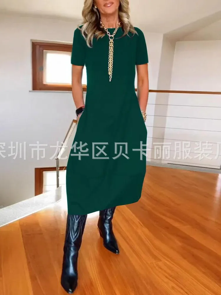 فستان نسائي صيفي جديد لعام 2025 فستان فضفاض غير رسمي بأكمام قصيرة ورقبة دائرية تي شيرت أنيق بلون واحد ملابس مكتب للسيدات