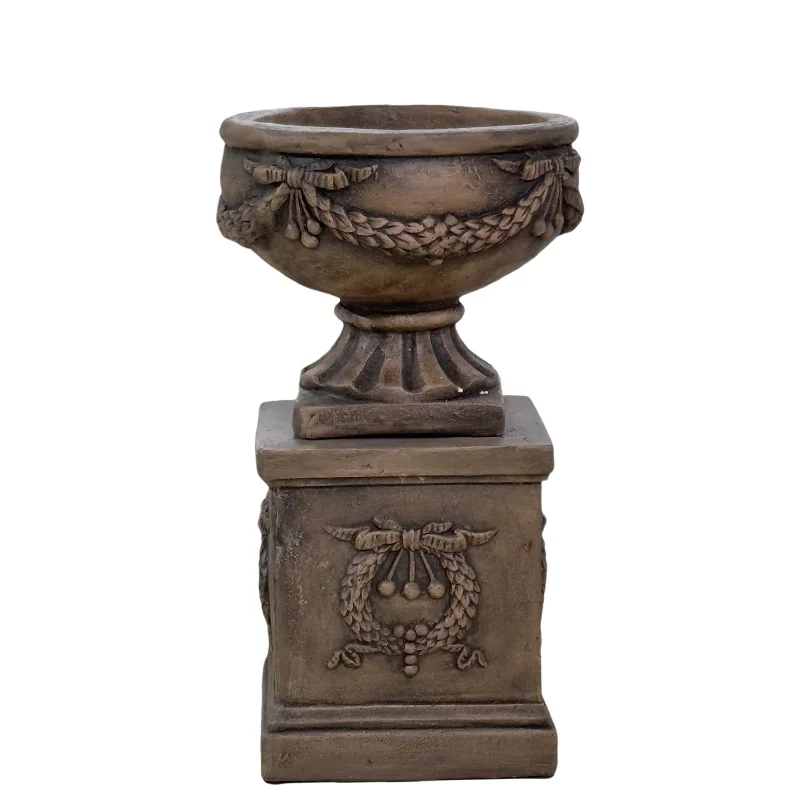 Large vintage cast stone flower pots and Roman columns rusted finish