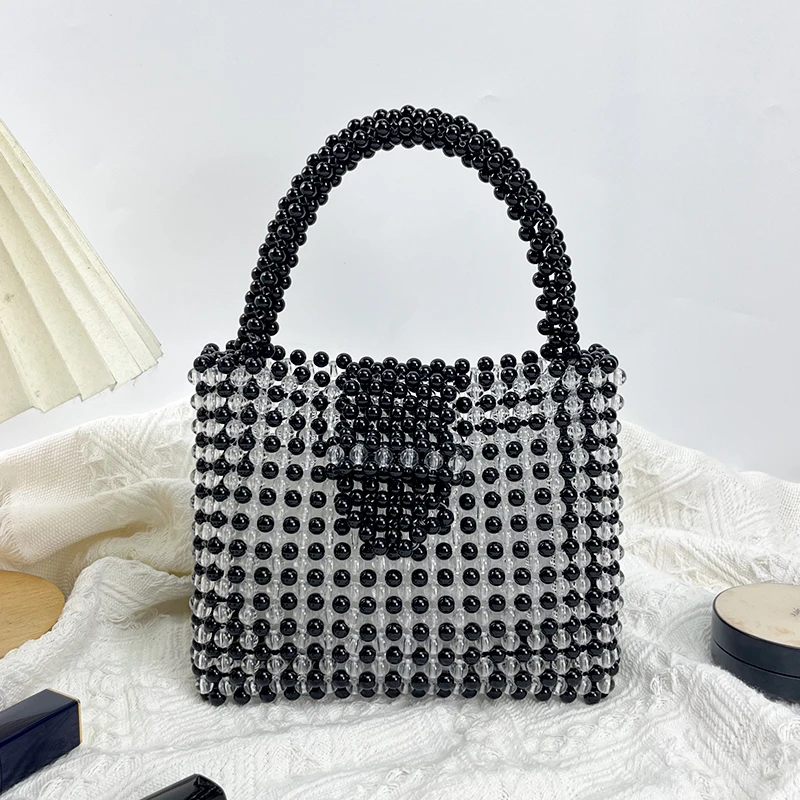 Simple and fashionable metal hand woven bead versatile high-end feeling, light luxury hand-held small square bag for women