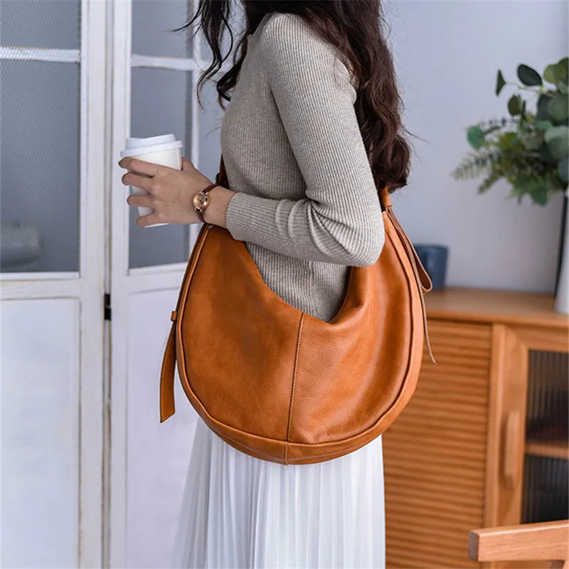 

PNDME high quality genuine leather women's lazy shoulder bag fashion designer cow leather dumpling bag underarm crescent bag