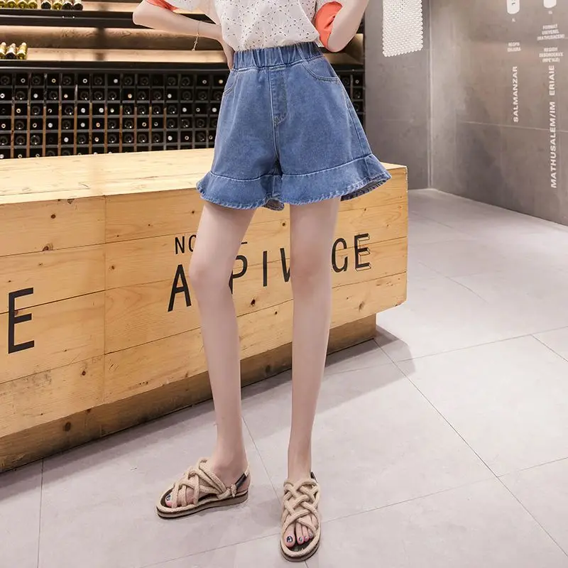 Pantaloncini di jeans per donna Pantaloncini di jeans di colore blu elastico estivo Pantaloncini da donna di moda stile coreano E9045