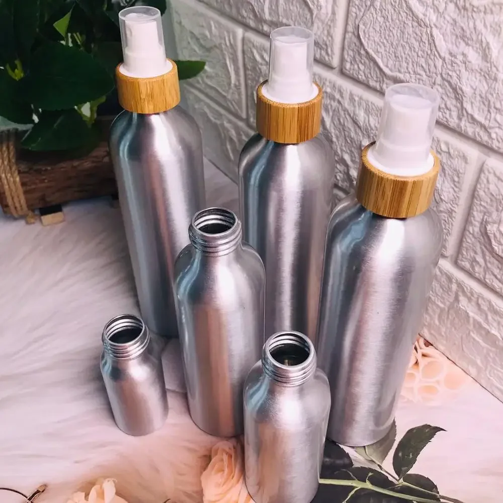 

sellingcosmetic containers wholesale aluminum bottle engraving logo on bamboo lid aluminum spray bottle with bamboo wooden caps