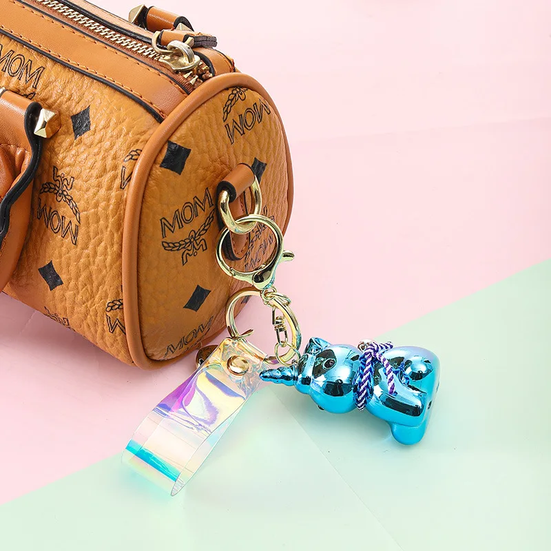 

miniso High-end cartoon keychains, car hangers, keychains, creative small statues, exquisite bag pendants and small gifts