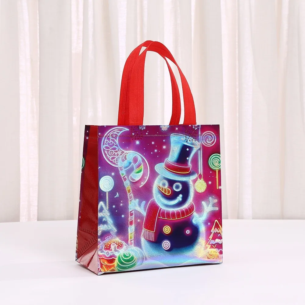 حقيبة هدايا عيد الميلاد غير المنسوجة الكرتون سانتا ثلج حمل الحقائب كيس تغليف الحلوى حقيبة تسوق مقاومة للماء أكياس هدايا عيد الميلاد السنة الجديدة