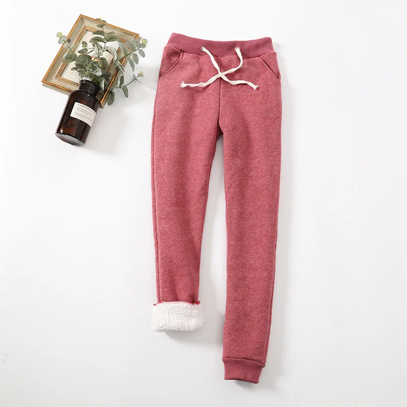 Nueva versión coreana de invierno, pantalones casuales cálidos de terciopelo de cordero de color sólido, pantalones de chándal gruesos de felpa para mujer, pantalones pequeños de talla grande