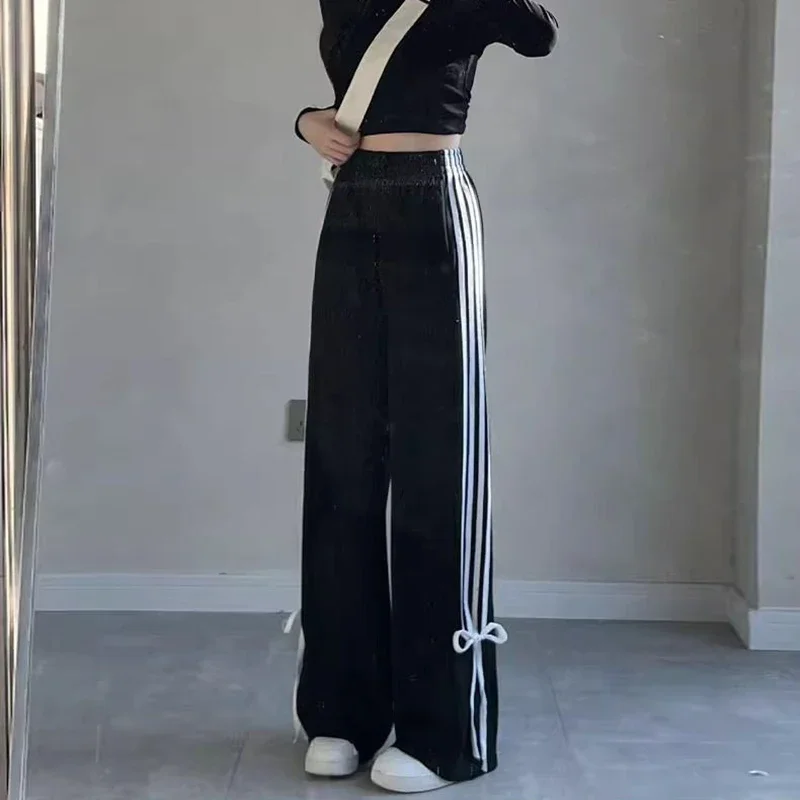 กางเกงขายาวเอวสูงสีเทาผูกโบว์สำหรับผู้หญิง กางเกงลายทางแบบแพทช์เวิร์คเก๋ไก๋ กางเกงแฟชั่นทรงหลวมขากว้างสำหรับสาวๆ