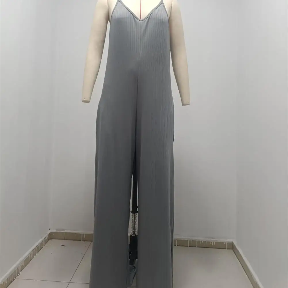 Jumpsuit tanpa lengan kaki lebar V-neck Backless tali Spaghetti pakaian keseluruhan wanita selangkangan dalam