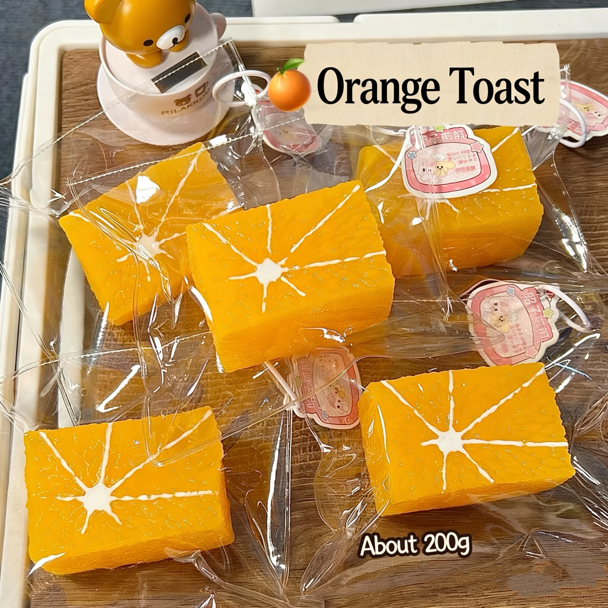 

1Pc Squishy! Orange Toast shaped to relieve stress - YOGURT PUREE & BUTTER Texture - Food grade silicone