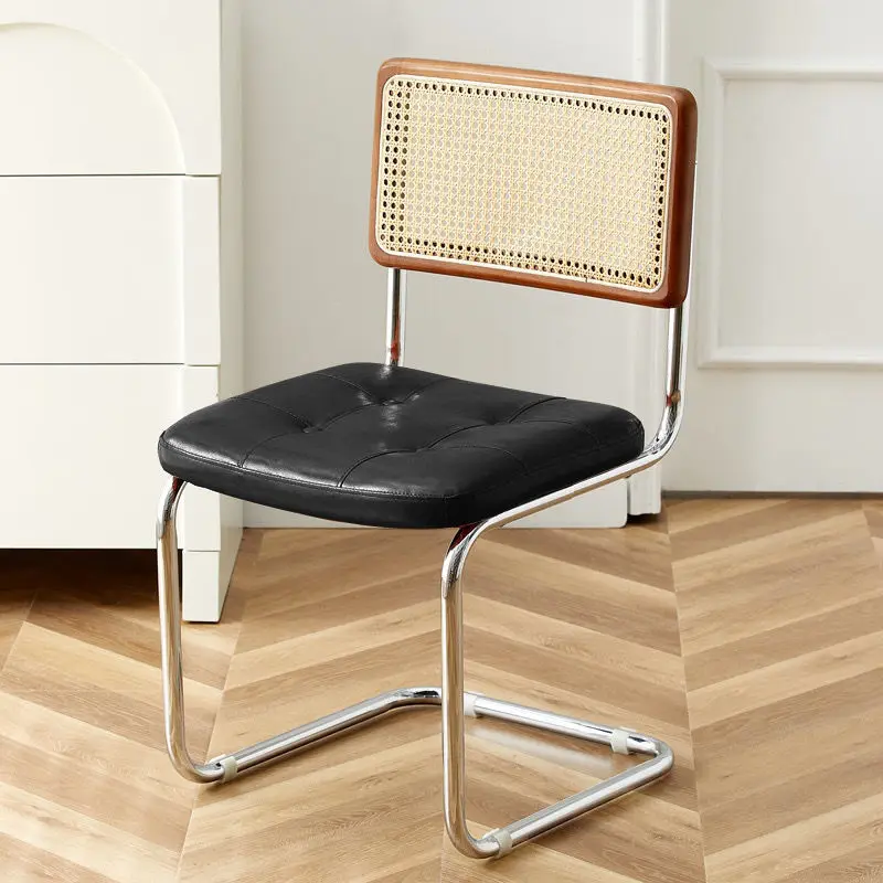 High-quality modern waterproof leather upholstered dining chairs with metal frames, suitable for dining room furniture