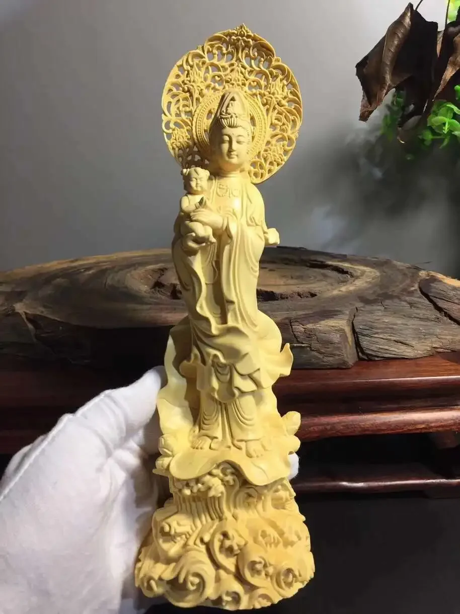 Chinese Boxwood Huang-yang wood carving Kwan-yin Guanyin statue  Boxwood with the image of a baby bearer
