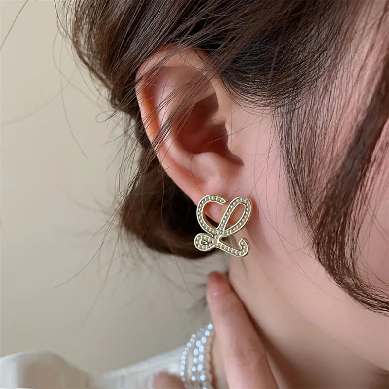 Korean Style Niche Design Pearl Geometry Personality Temperament High-end Unique Earrings for Women Jewelry.