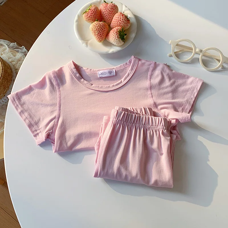 Children's home suit set, short sleeved pants, summer thin design, boys' and girls' pajamas, solid color air-conditioned suit