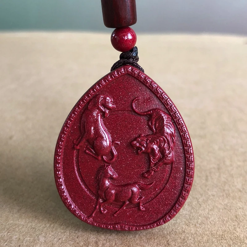 

The cinnabar zodiac pendant belongs to the noble Zijin Sand Yinwu Gift Certificate of Tiger, Horse and Dog.