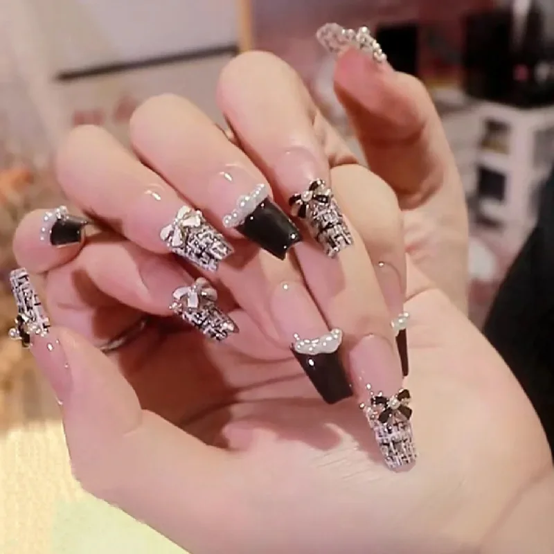 Wear a Wholesale Medium and Long Black Chanel Style Alloy Butterfly Patch Removable Finished Beauty Nail Tip