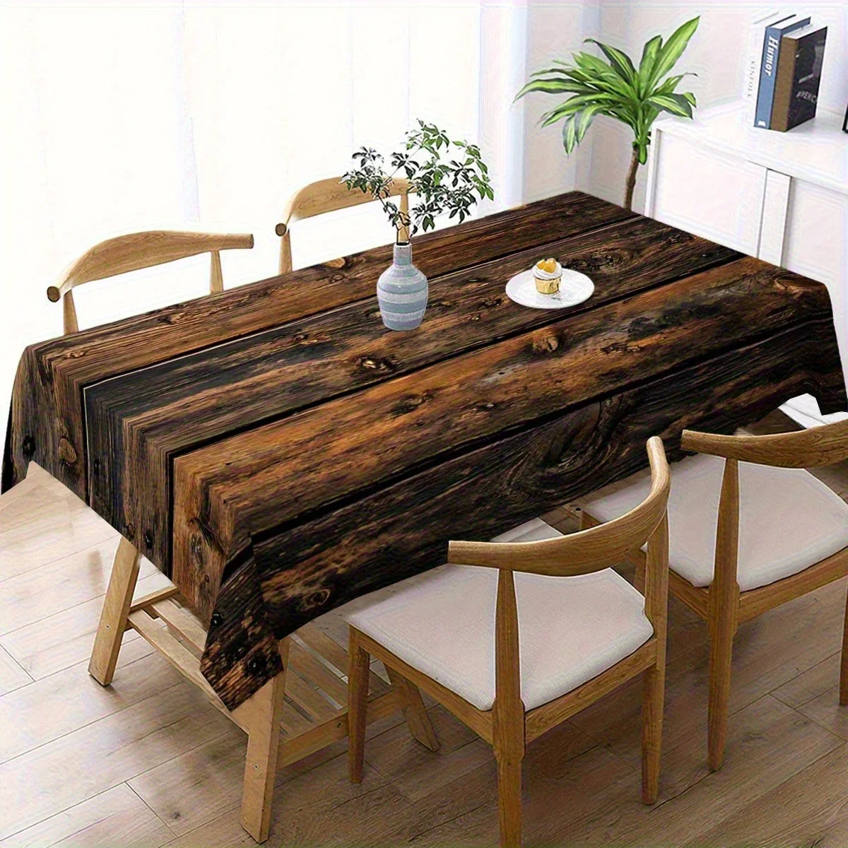 Country-style wood-grain polyester tablecloth with a fan-shaped edge, featuring dark brown and black wood-grain design.