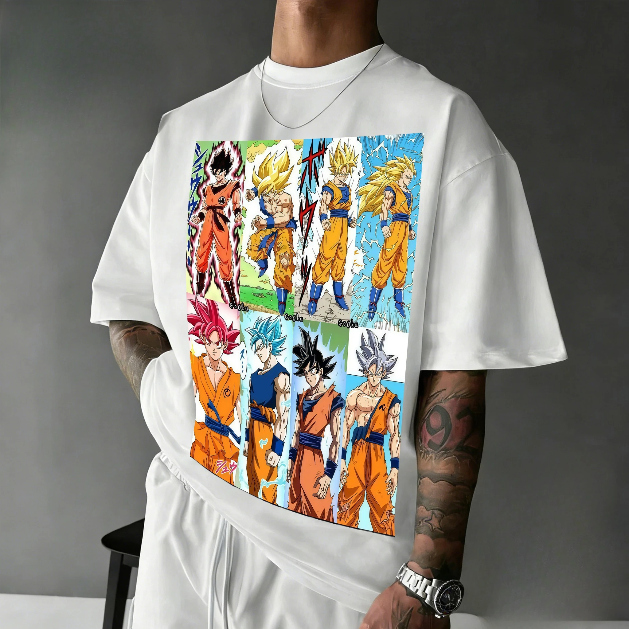 

Новинка 2026: Футболка унисекс оверсайз из хлопка с винтажным принтом Гоку в различных формах для фанатов DBZ. Аниме-топ.