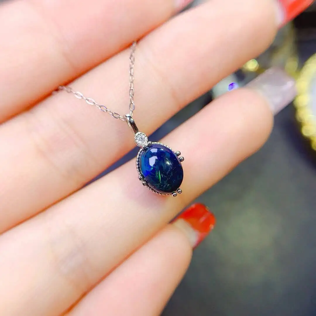 KJJEAXCMY New Natural Women's Color-changing black Opal Pendant 925 silver inlay Colorful and splendid Crystal pure fire flash