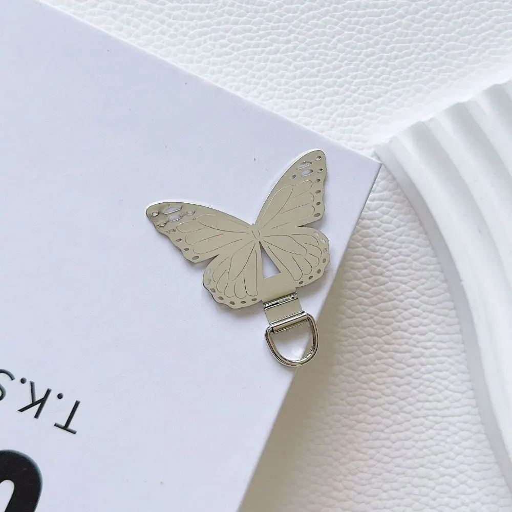 

Металлическая пластина-крепление для телефона из нержавеющей стали в форме бабочки, для подвешивания, с защитой от потери, для ремешка/шнурка для телефона