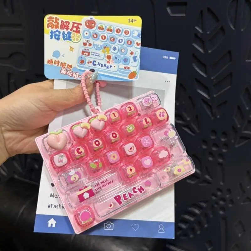 Niedliches Fidget-Tastatur-Spielzeug mit Kirschmotiv, zur Stressbewältigung, mit süßen Cartoon-Motiven, ideal zur Entspannung, für Büro, Freizeit und als Geschenk für Teenager. – Detail 5