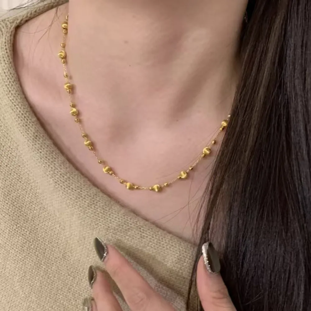Female small design sense cat eye beaded broken gold simple imitation gold collarbone chain 9999gold