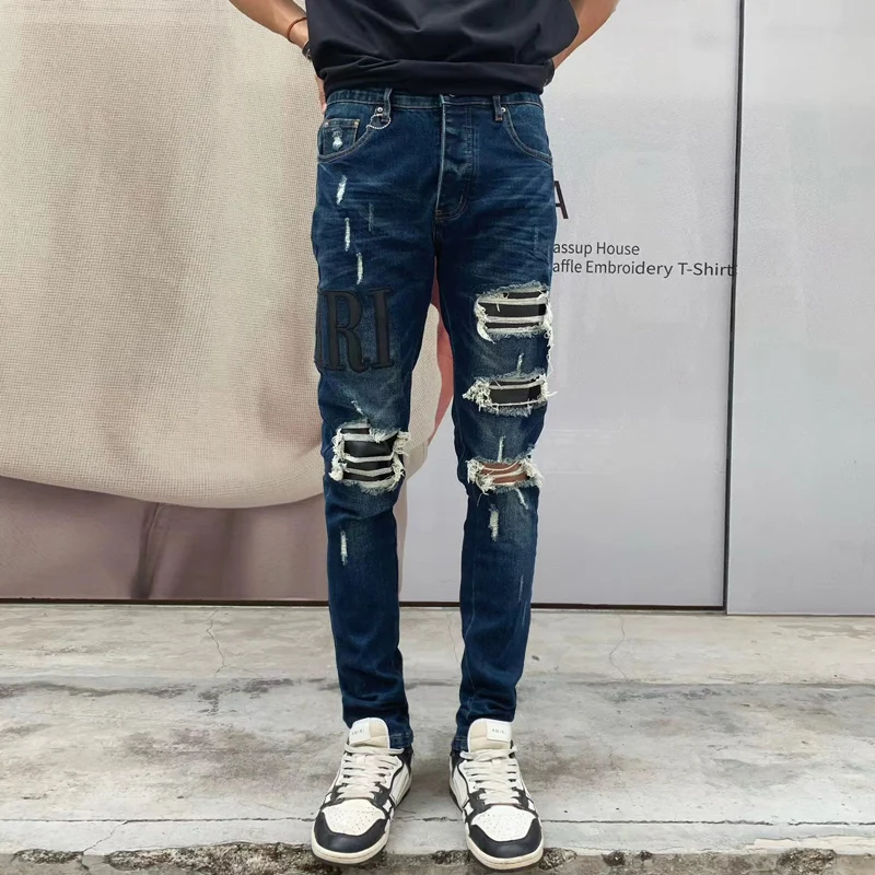 Latest designer high street fashion new men's jeans stretch slim fit retro washed leather patch deep blue jeans hip-hop splicing