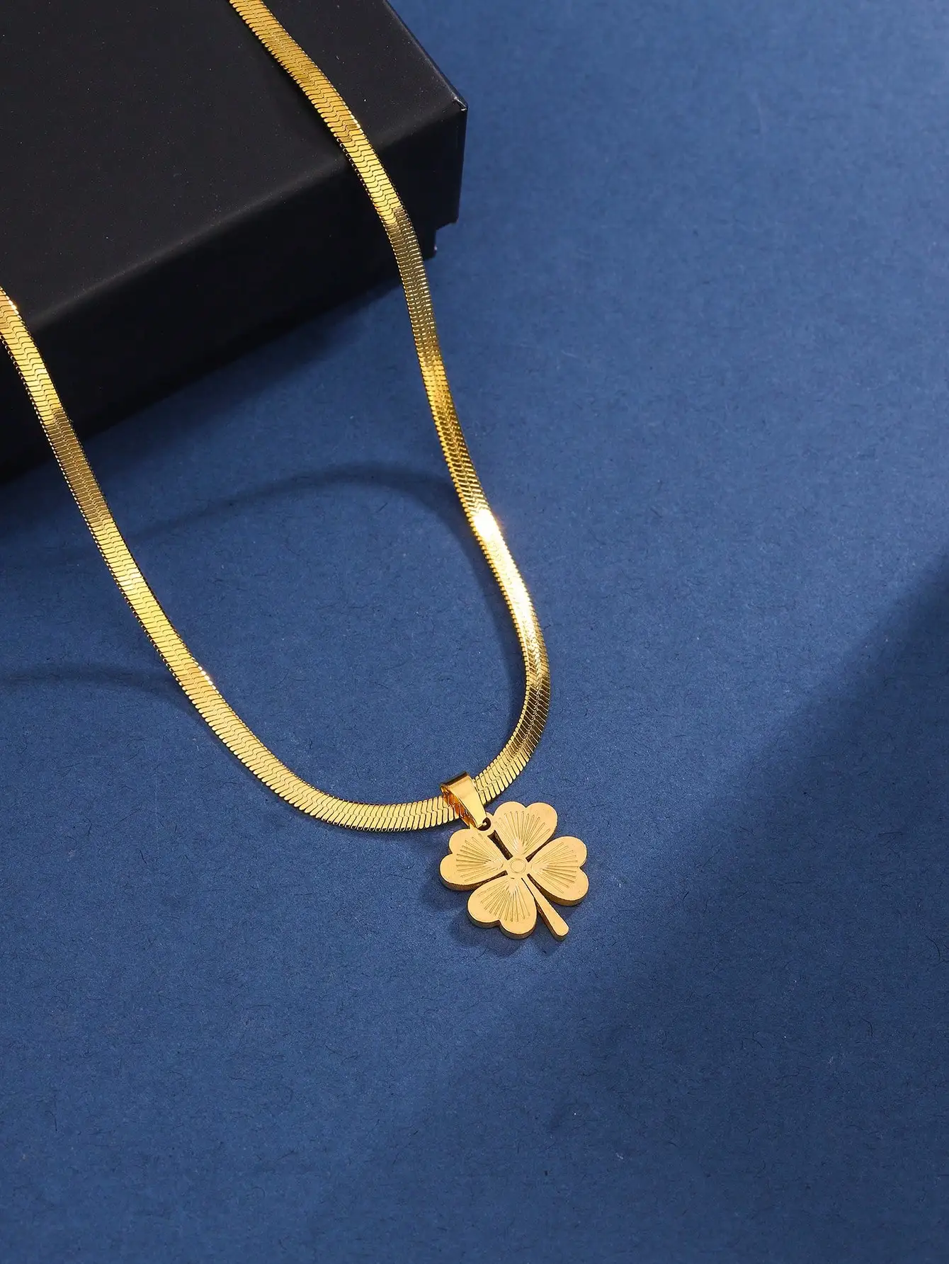 

Gold Plated Stainless Steel Herringbone Chain Necklace with Four-Leaf Clover Pendant