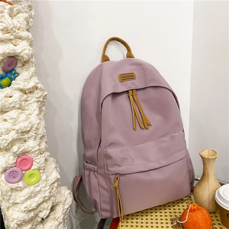 Fashionable and Casual Lightweight Nylon Backpack Large Capacity Multi Compartment Student Bag Travel Bag Suitable for Daily Use