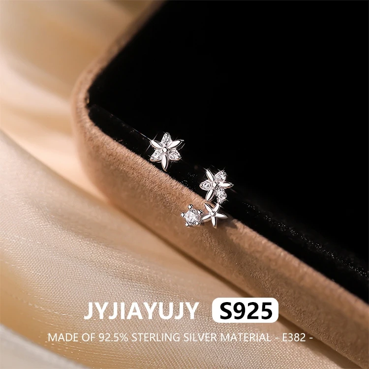 

JYJIAYUJY 100% Whole Original Sterling Silver S925 Stud Earrings Asymmetric Flowers Inlaid Zirconia Fashion Woman Jewelry E382