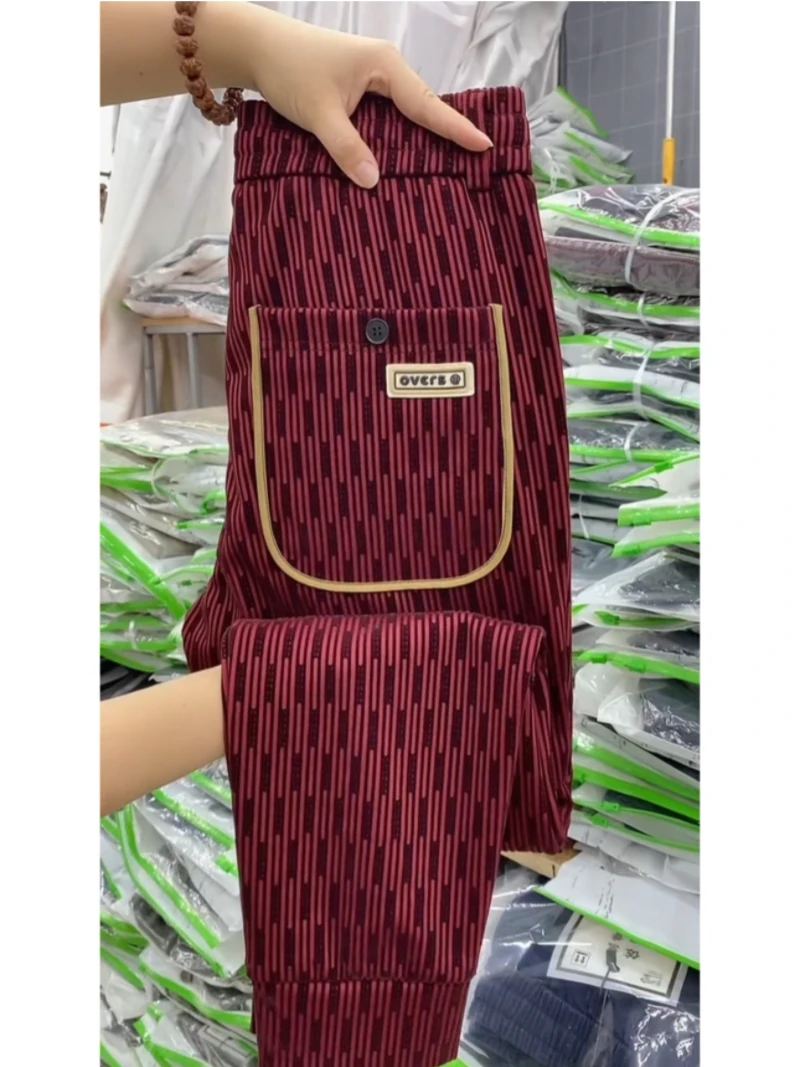 

Мужские повседневные брюки, осень-зима, модные универсальные бархатные свободные длинные брюки с эластичной резинкой на талии, облегающие брюки из полиэфирного волокна